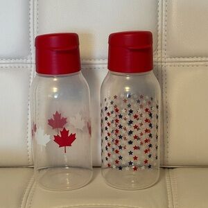 NWOT Tupperware Red and Clear Leaf and Star Bottles